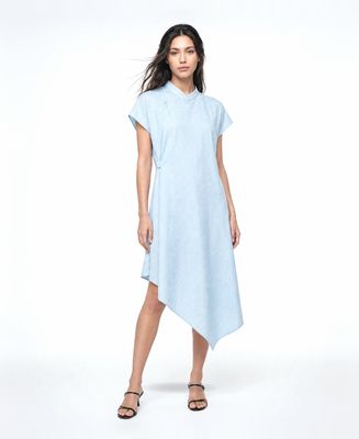 a woman wearing a blue dress and sandals