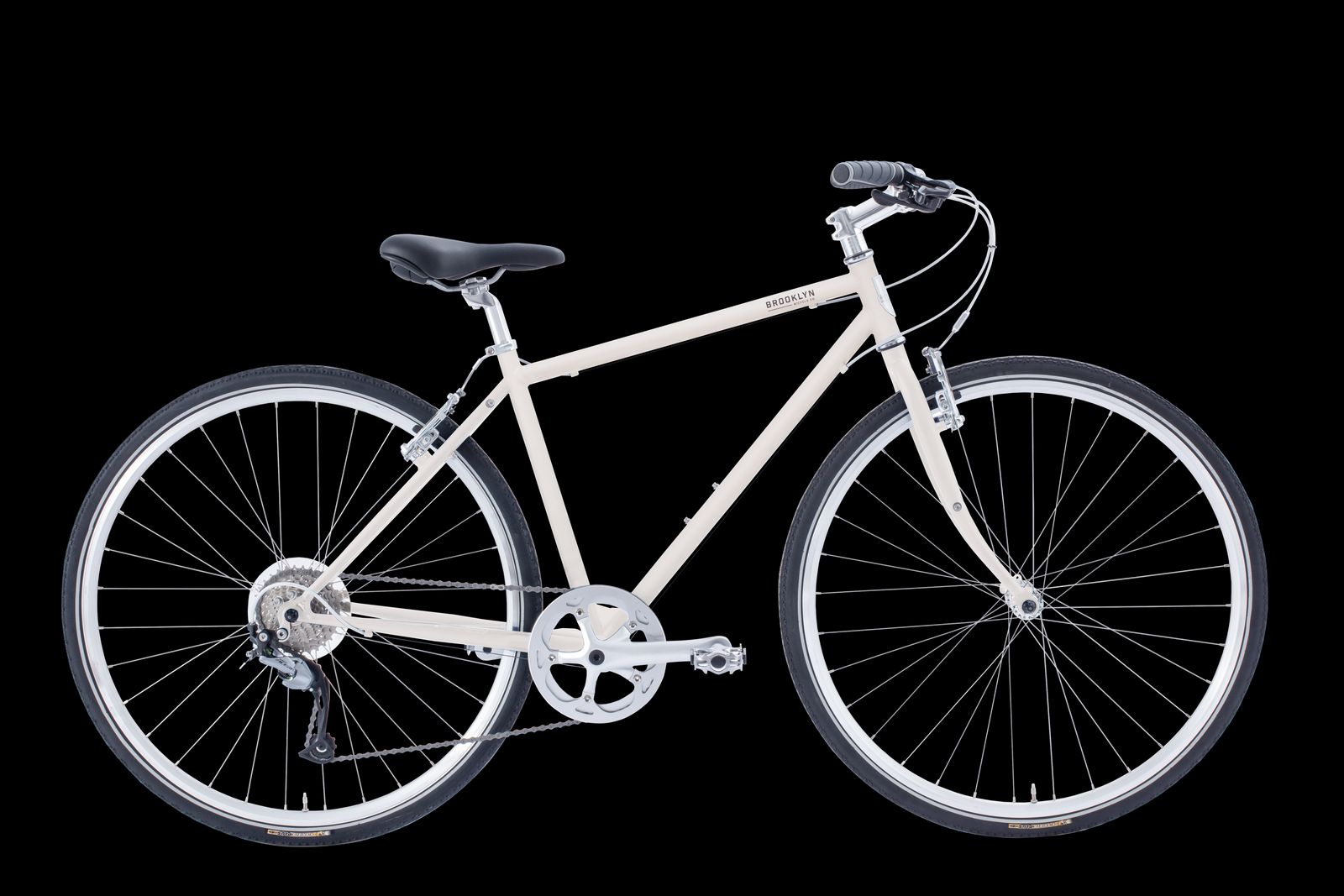 a white bicycle is shown against a black background