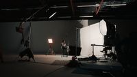 a photo studio with lighting equipment and lighting equipment