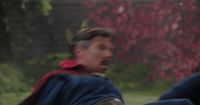 a blurry image of a man in a superman costume