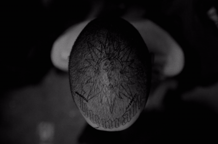 a black and white photo of a person's hair