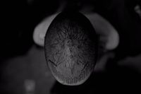 a black and white photo of a person's hair