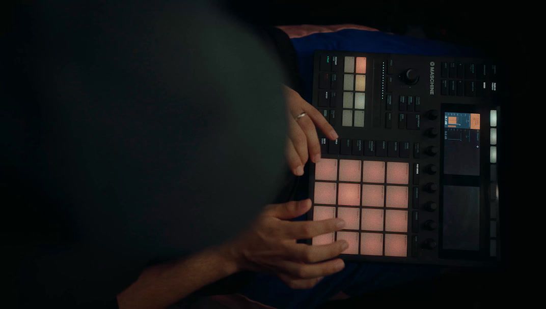 a close up of a person holding a control panel