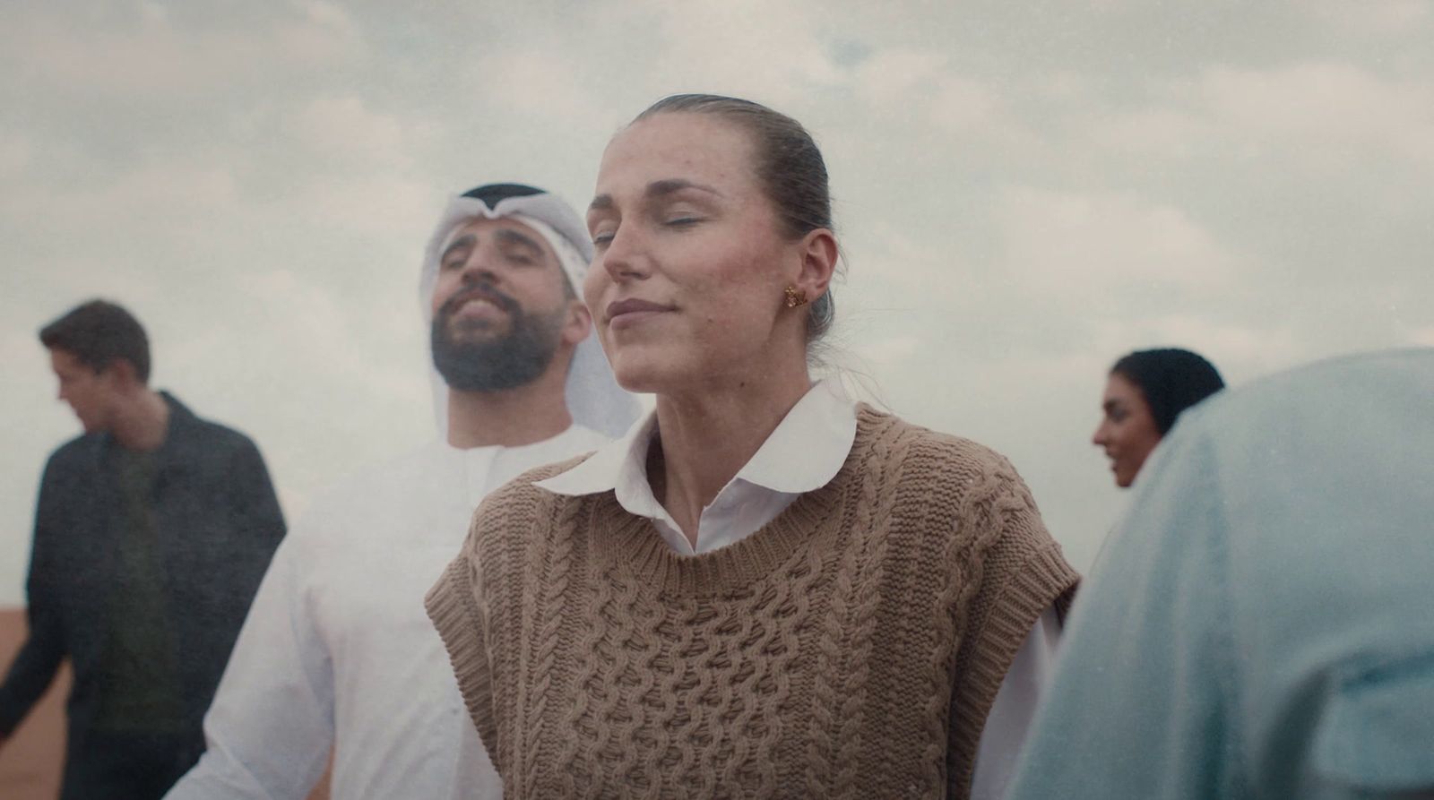 a man and a woman standing next to each other