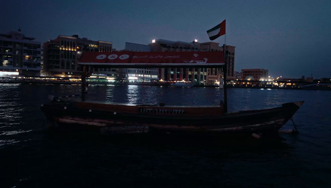 a boat floating on top of a body of water