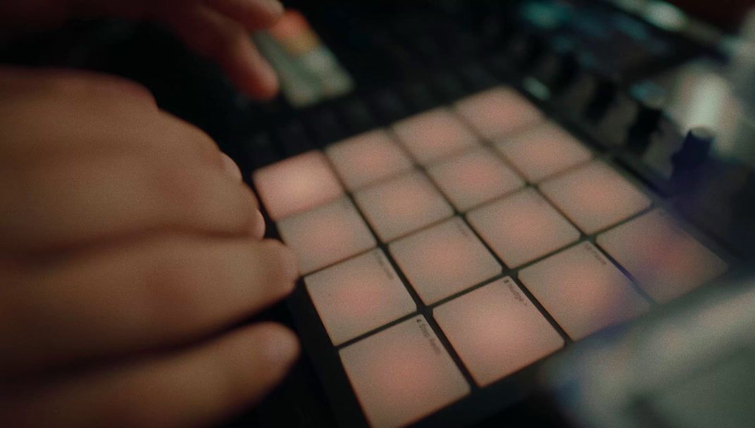 a close up of a person using a sound board