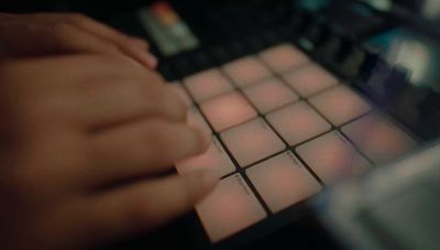 a close up of a person's hand on a keyboard