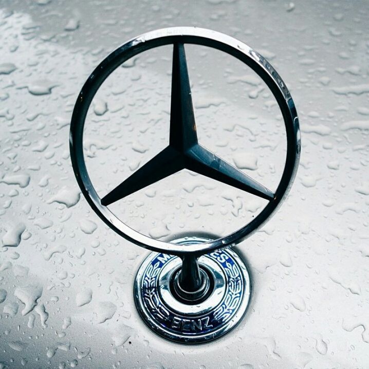 a mercedes emblem on the hood of a car