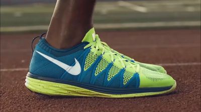 a close up of a tennis player's shoes