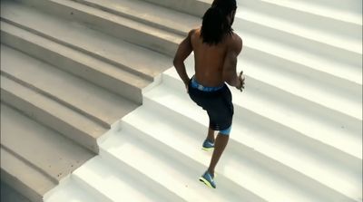 a man running down a flight of stairs