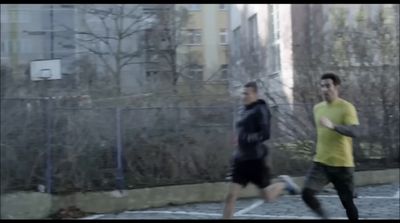 a couple of people that are running in the street