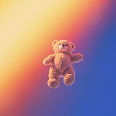 a brown teddy bear floating in the air