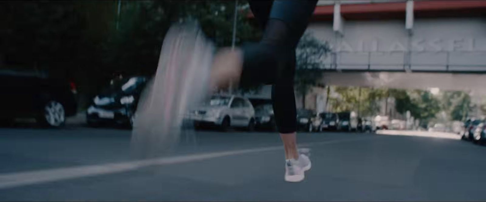 a person jumping in the air on a skateboard