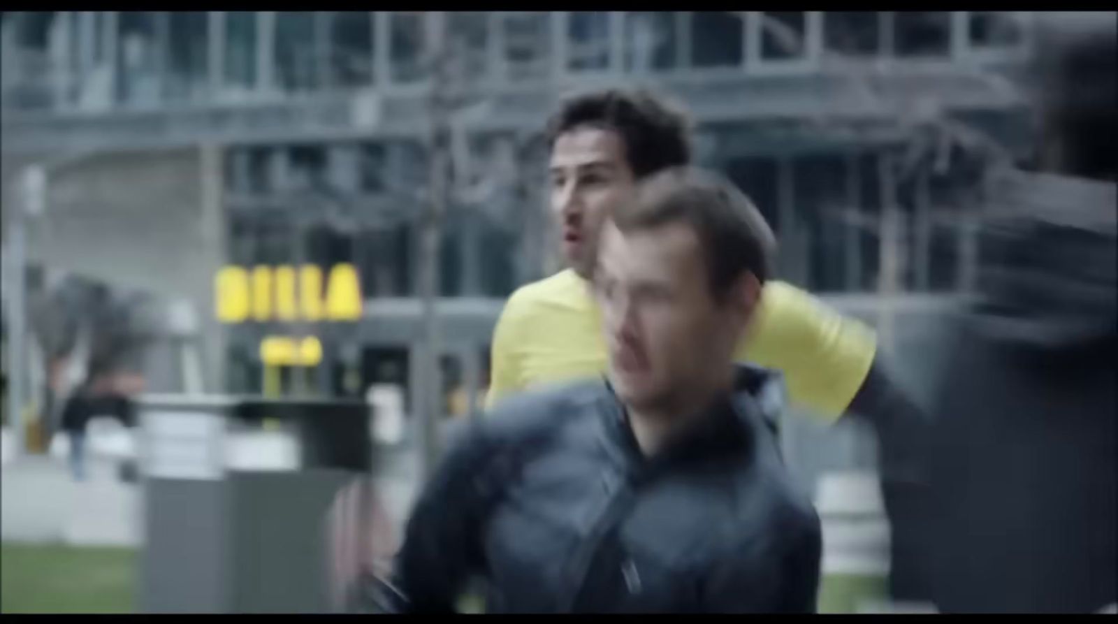 a blurry photo of two men running