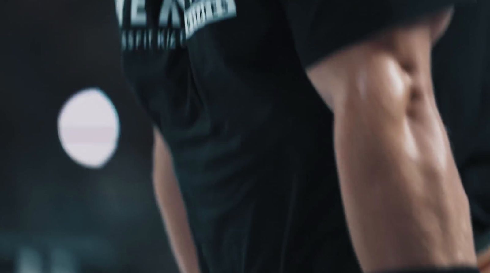 a close up of a person wearing a black shirt