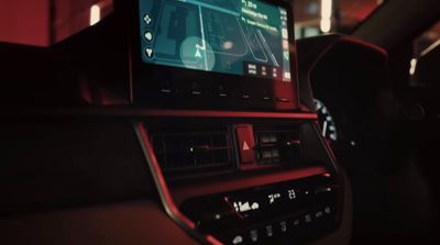 the dashboard of a car with a large screen