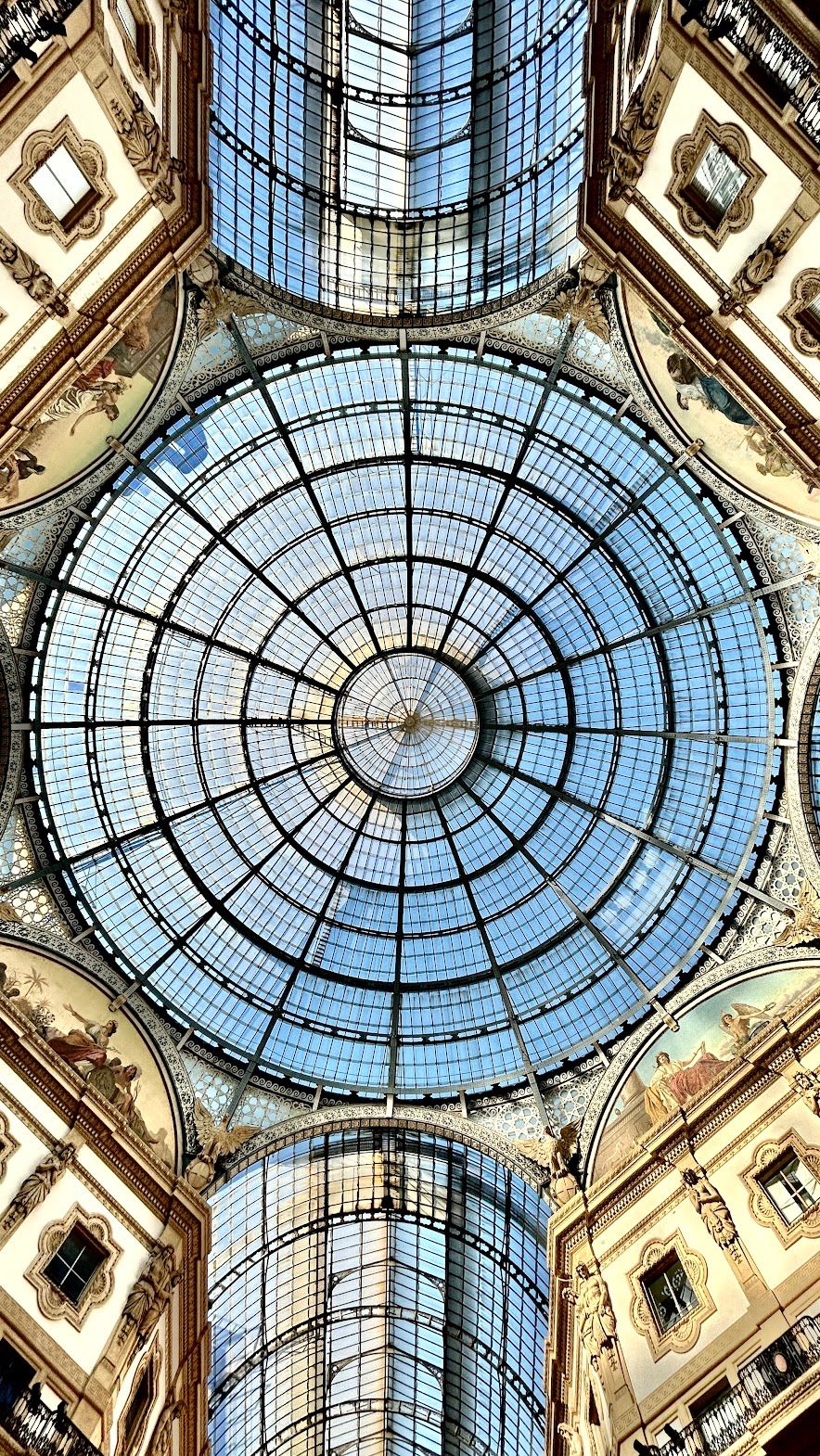 the ceiling of a building with a glass dome