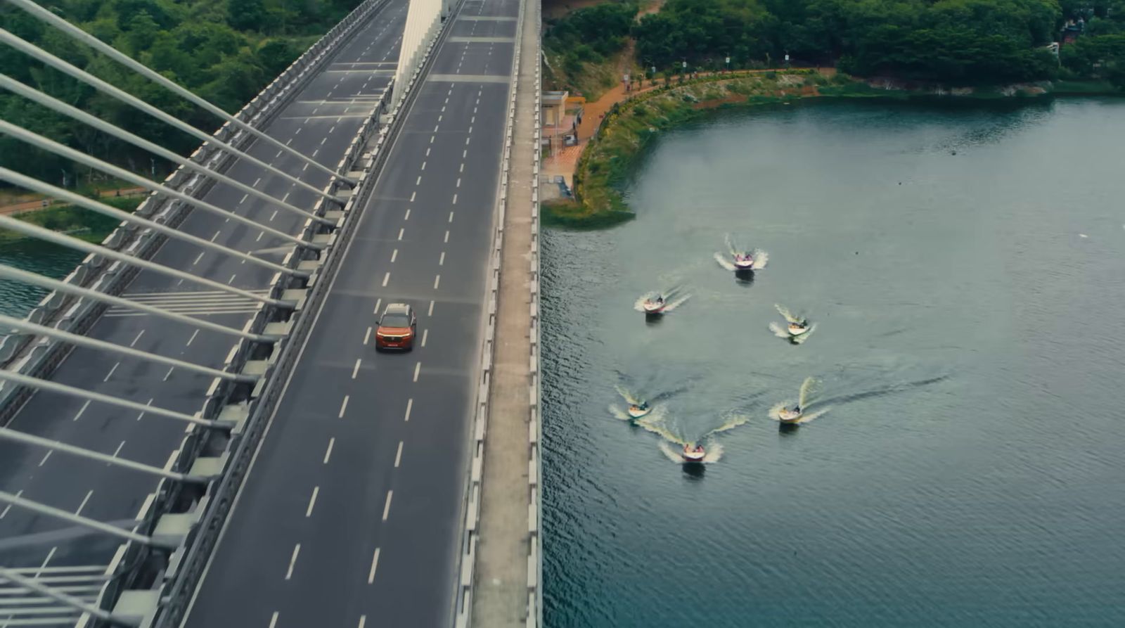 a bridge over a body of water with boats on it