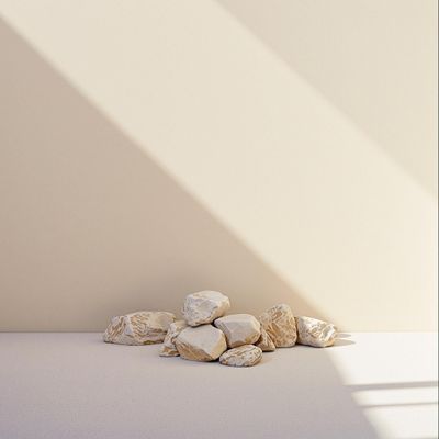 a pile of rocks sitting on top of a white floor