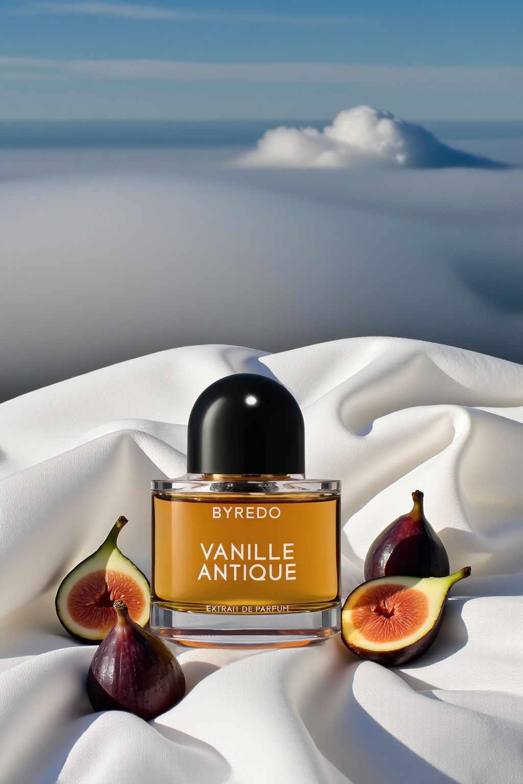 a bottle of perfume sitting on top of a white sheet