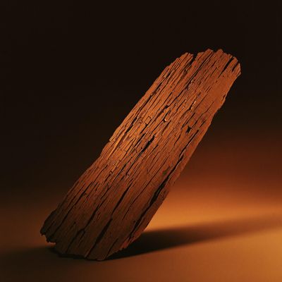 a piece of wood sitting on top of a table