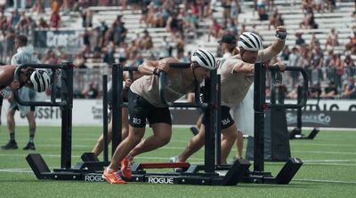 a group of men working out on a field