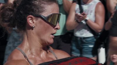 a woman with sun glasses on her face