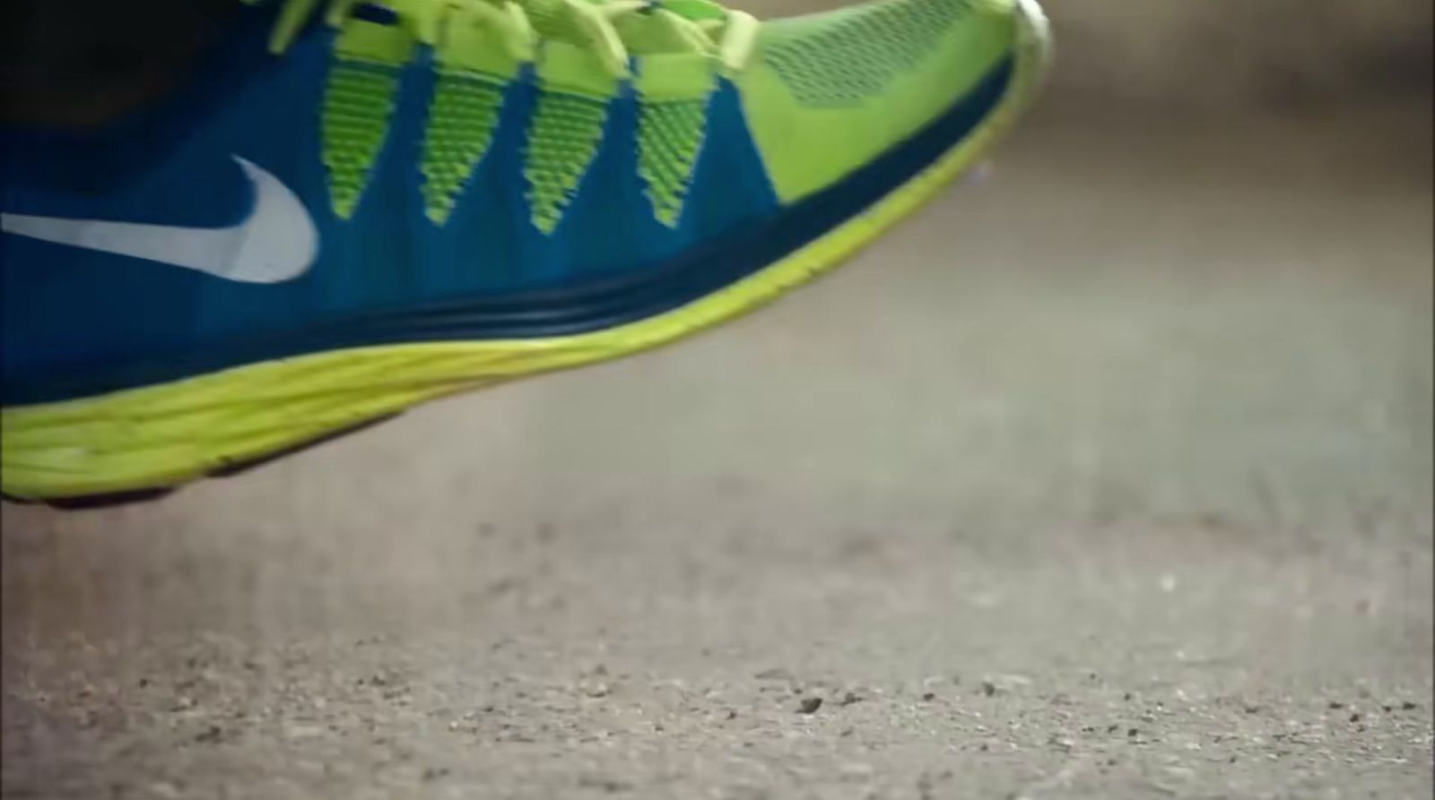 a close up of a person's running shoes