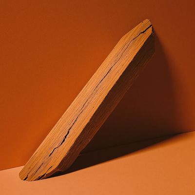 a piece of wood sitting on top of a table
