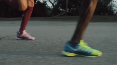 a close up of a person's feet and shoes