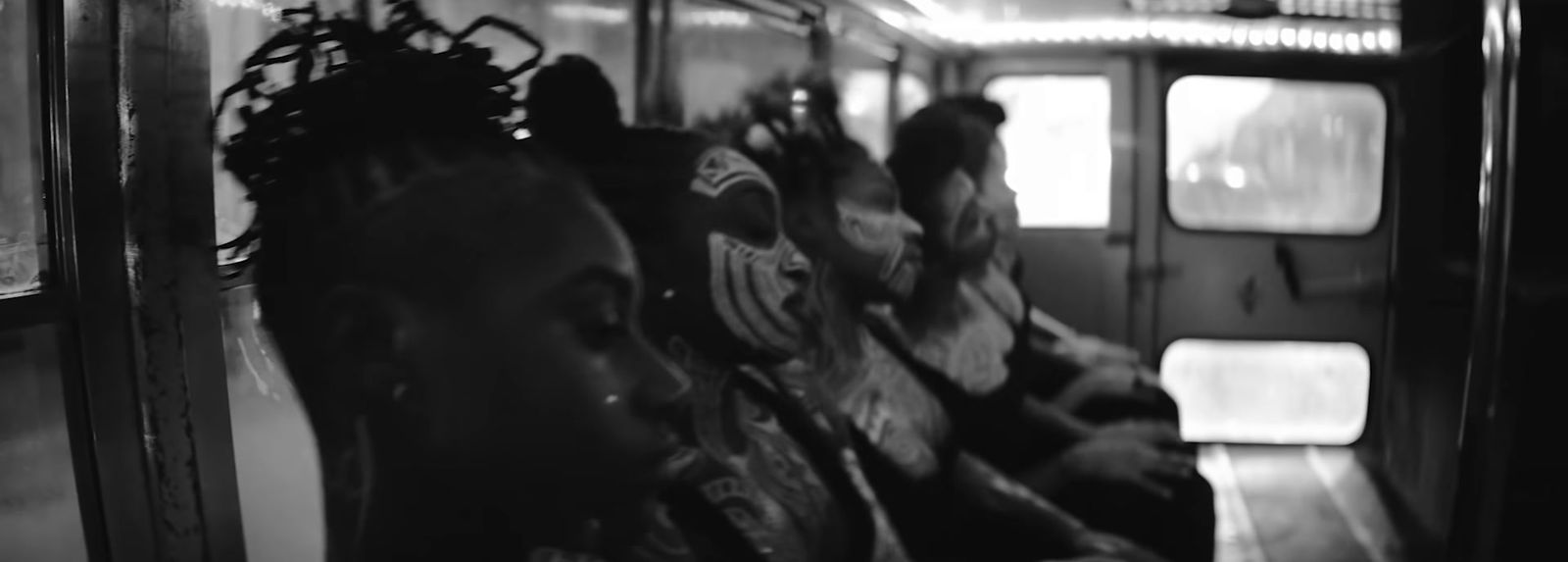 a black and white photo of a subway car