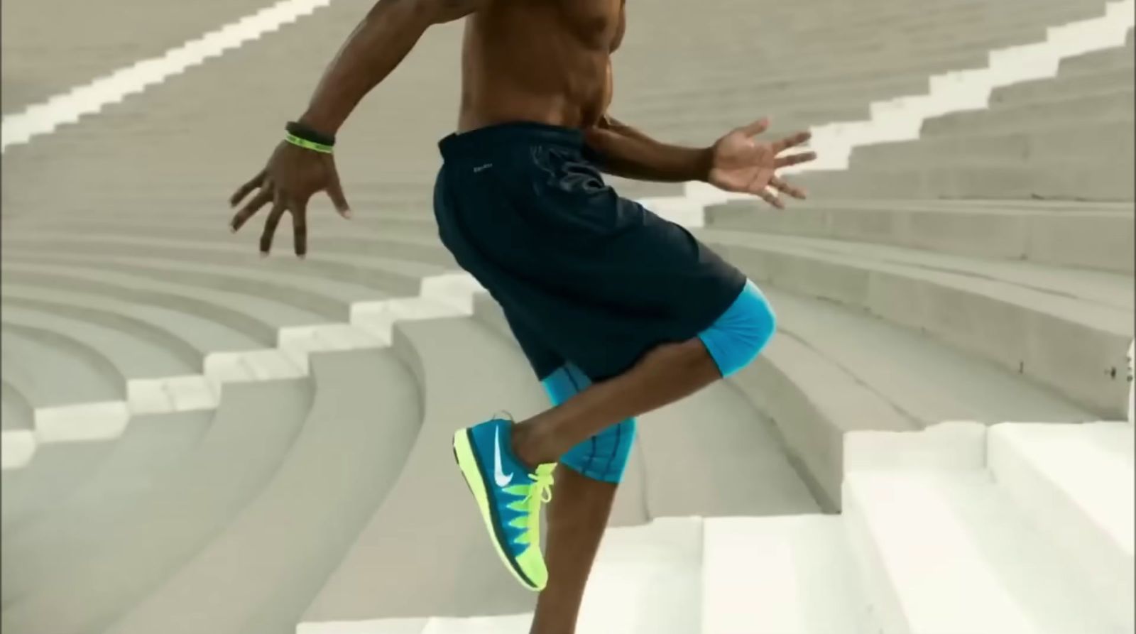 a man is running down a set of stairs