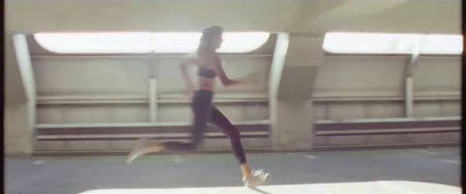 a blurry photo of a woman running