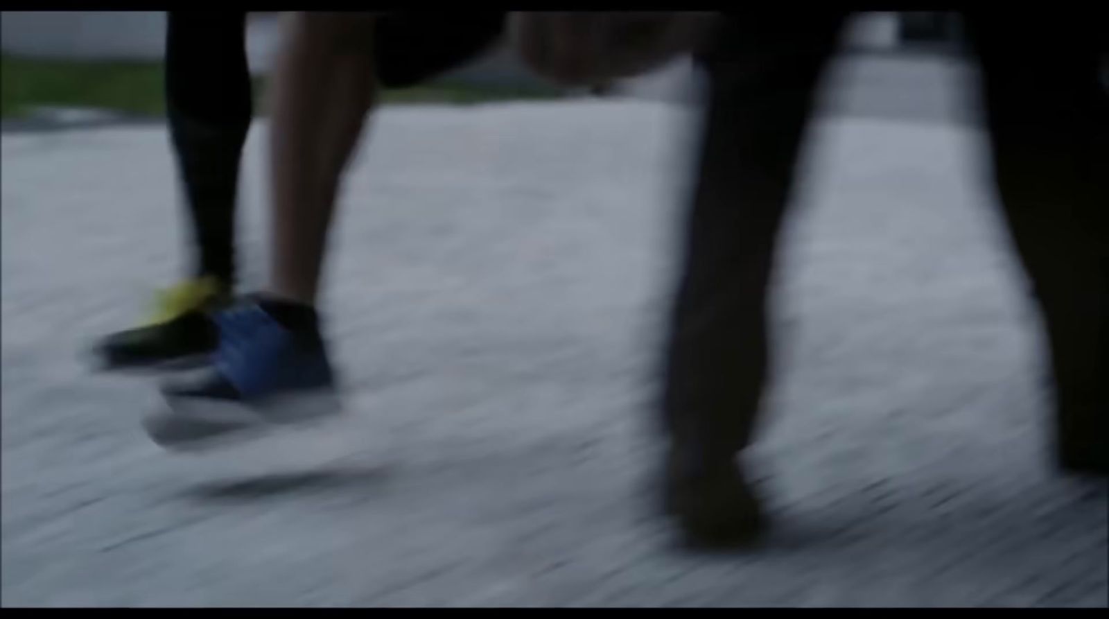 a close up of a person riding a skateboard