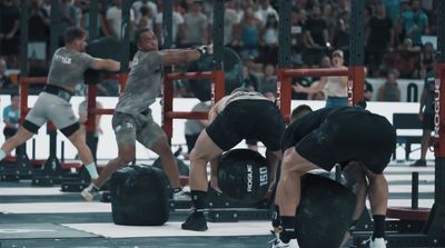 a group of men working out in a gym