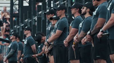 a group of men standing next to each other