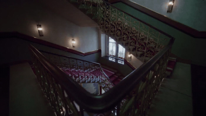 a view of a staircase from the top of it