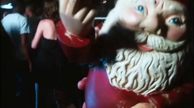 a close up of a statue of santa claus