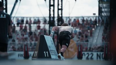 a man standing on top of a metal ramp