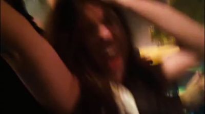 a blurry photo of a woman dancing