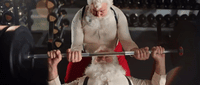 a man dressed as santa claus lifts a barbell