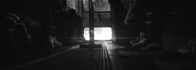 a black and white photo of the inside of a bus