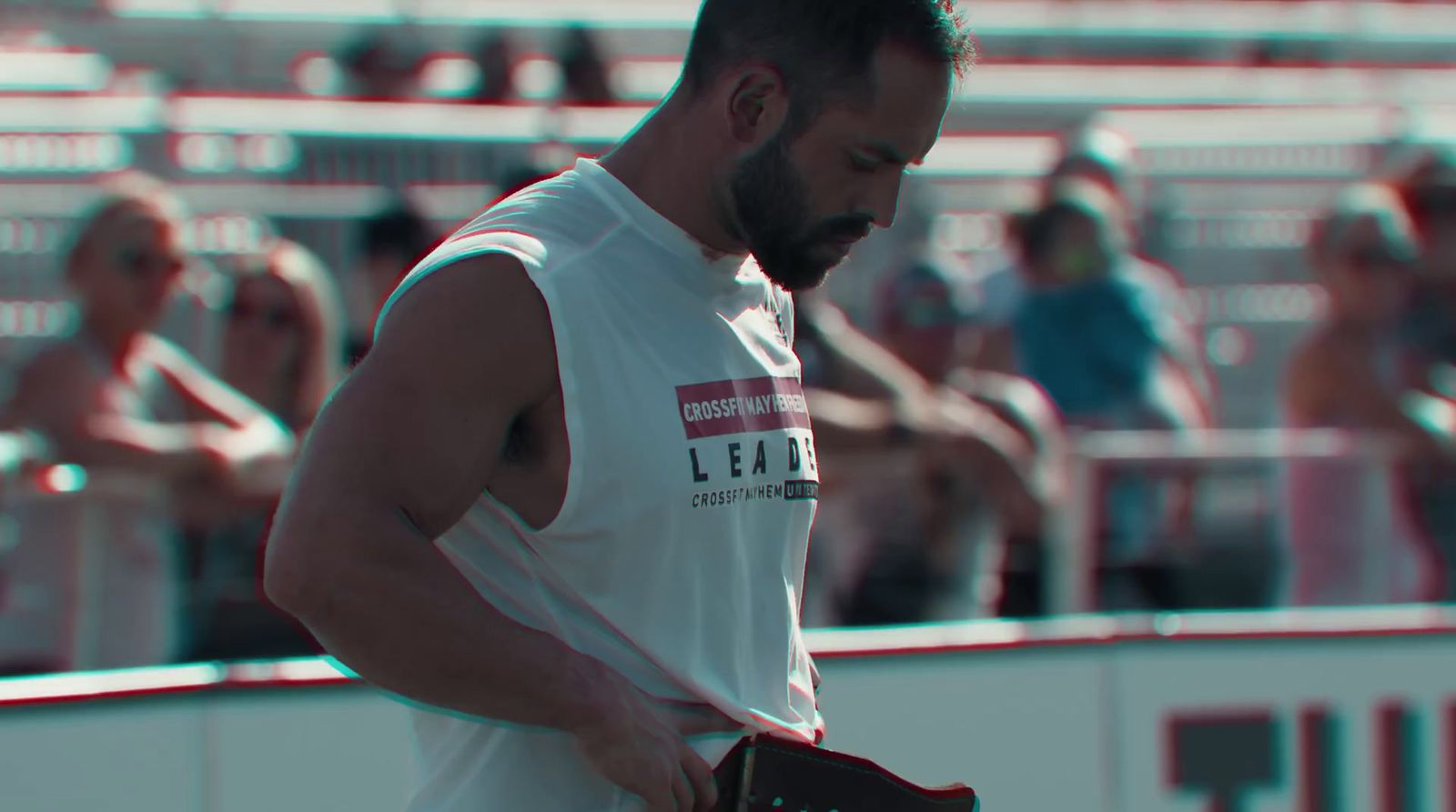 a man holding a tennis racquet on top of a tennis court