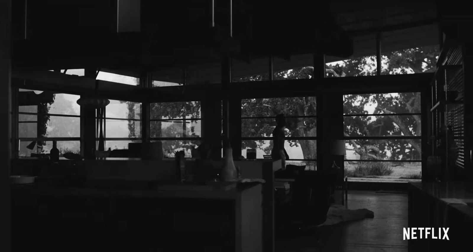 a black and white photo of a kitchen