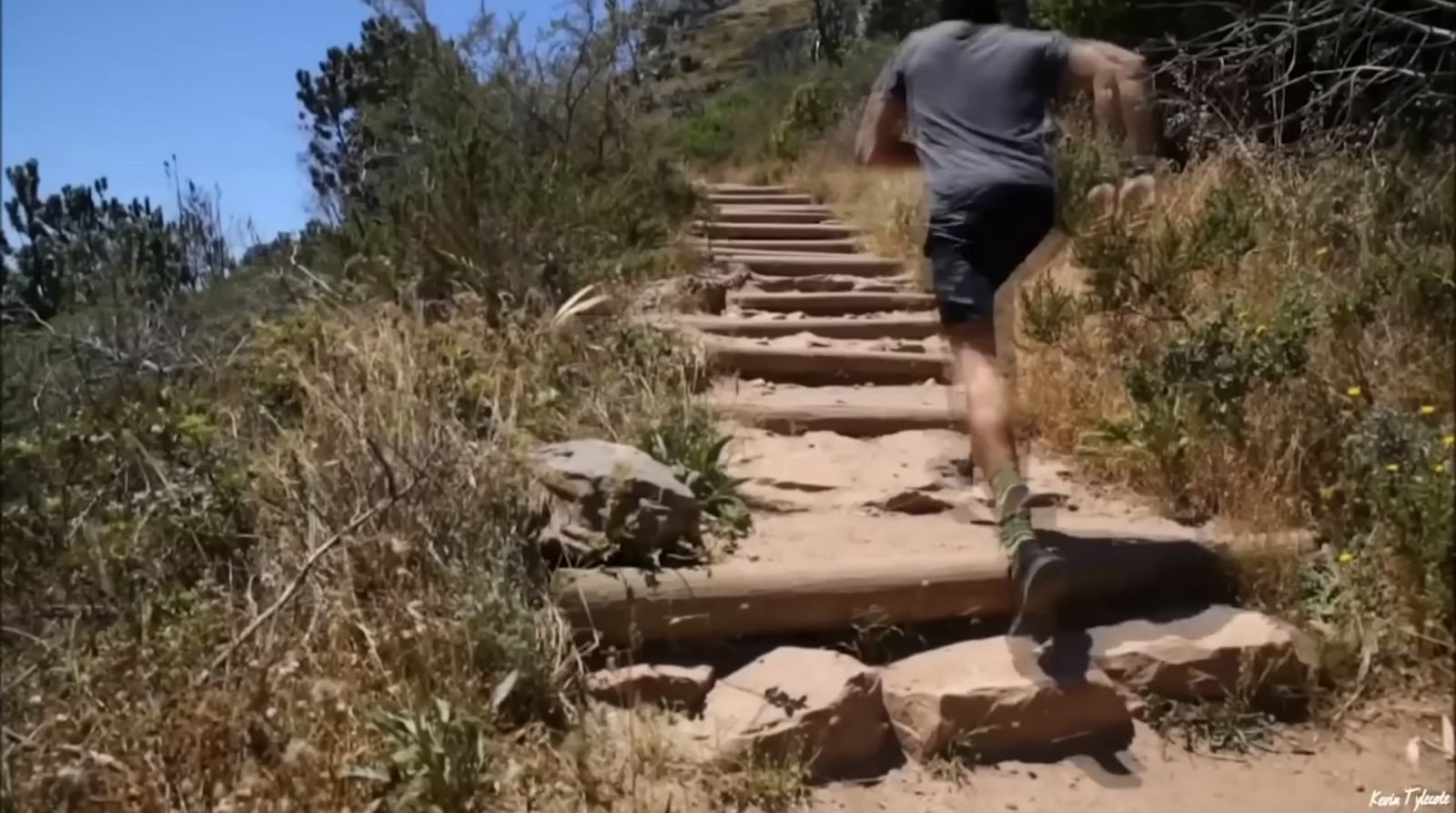 a man is running down a set of stairs