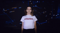 a mannequin wearing a control t - shirt in front of a dark background