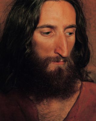 a close up of a person with a beard