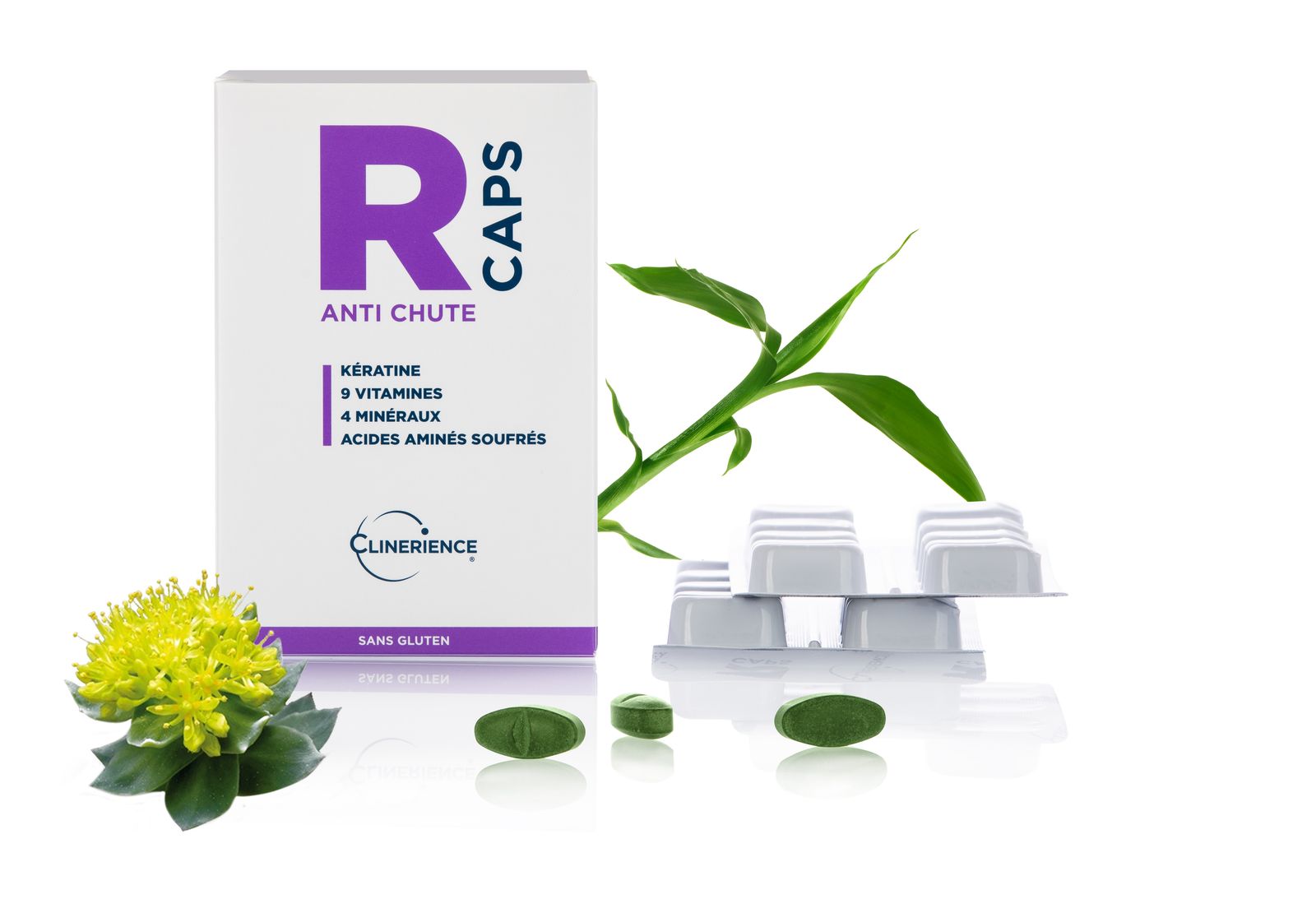 a box of r caps next to some flowers