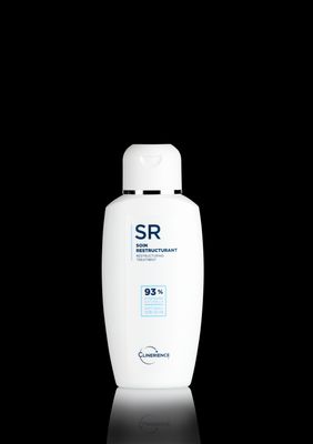 a bottle of shampoo on a black background