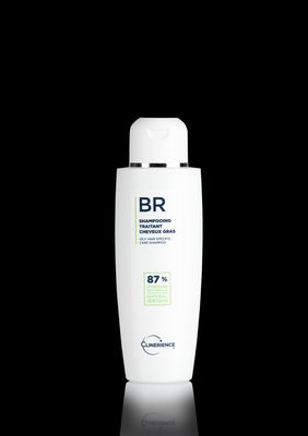 a bottle of shampoo on a black background